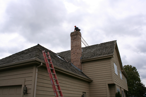 Installing a Chimney Cap Way Up high